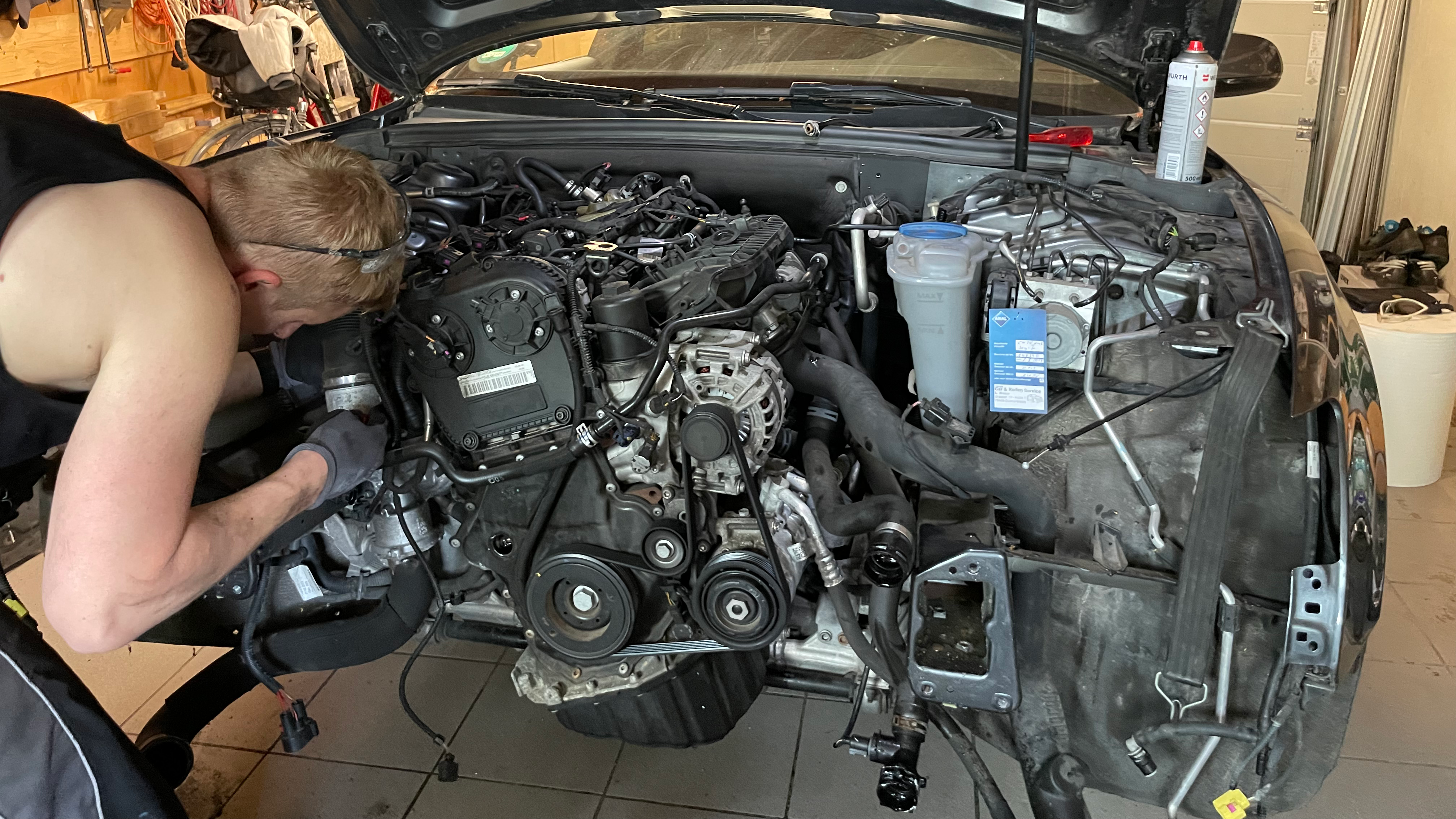 Mathias Dick working on his car